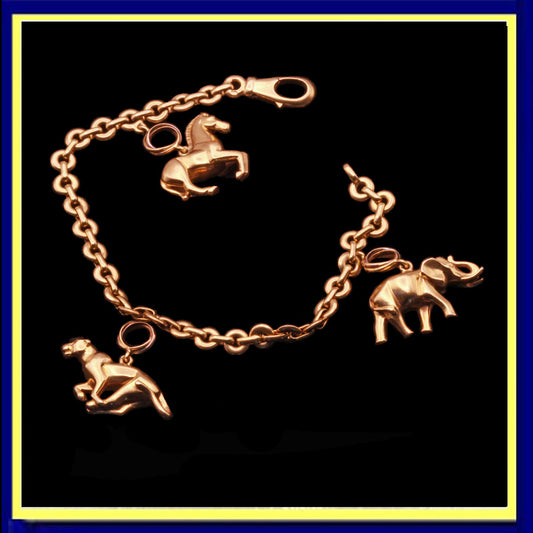Cartier charm bracelet gold panther elephant horse Trinity
