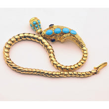Antique Victorian bracelet snake gold turquoise garnets amethyst white background