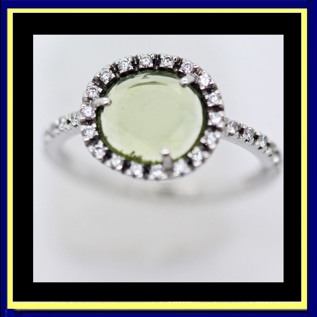 Pomellato ring gold peridot diamonds papers box