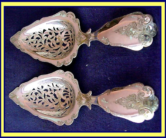 Antique Victorian pair silver Dutch berry fruit serving spoons